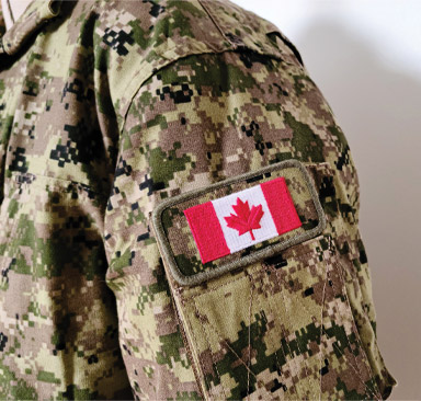 A Canadian military uniform with a Canadian flag patch.