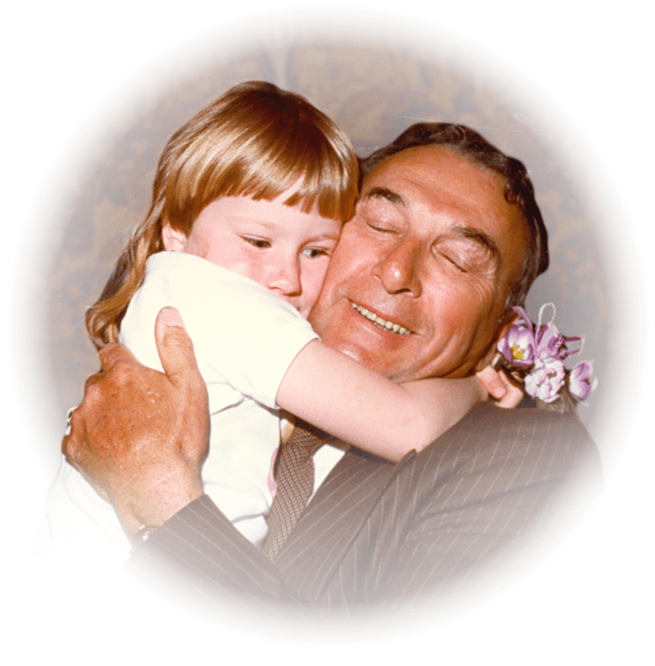 Clifford Chadderton hugging a child amputee.